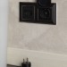 Розетка BRITE РСбш10-3-БрЧ 16А IP20 с заземл. защ. шторки с крышкой механизм черн. IEK BR-R16-16-K02