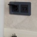 Розетка BRITE РСбш10-3-БрГ 16А IP20 с заземл. защ. шторки с крышкой механизм графит IEK BR-R16-16-K53